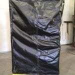 Single Pick Material Platform With Custom Tarp.Front view, open gate. Protective cover