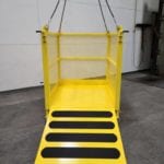 Custom Crane Suspended Material Platform with Casters. Front view, open ramp