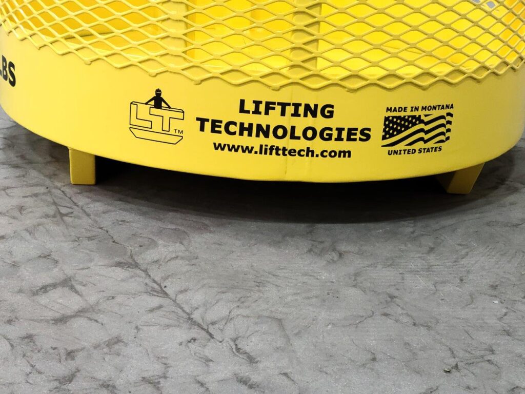 Crane hoisting material basket Lifting Technologies